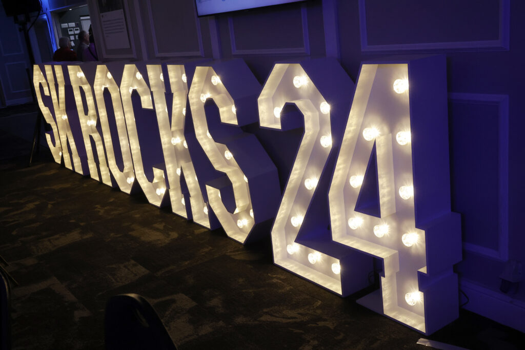 Image of light boxes spelling out 'SK ROCKS'